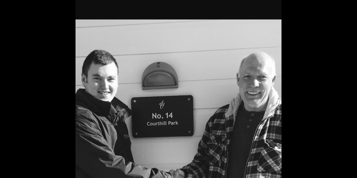 Shaking hands with a new resident at Courthill Park